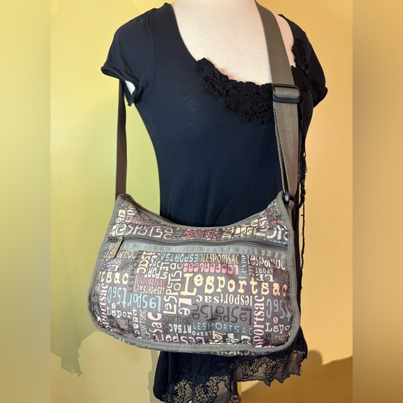 Lesportsac Handbags - LeSportsac Pastel Graphic Text Crossbody Bag